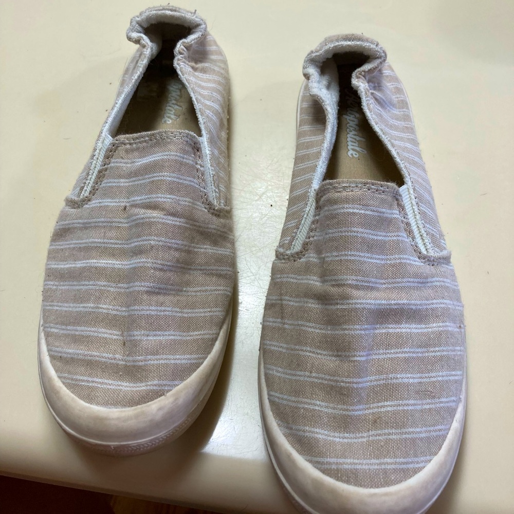 Tan and white canvas sneakers